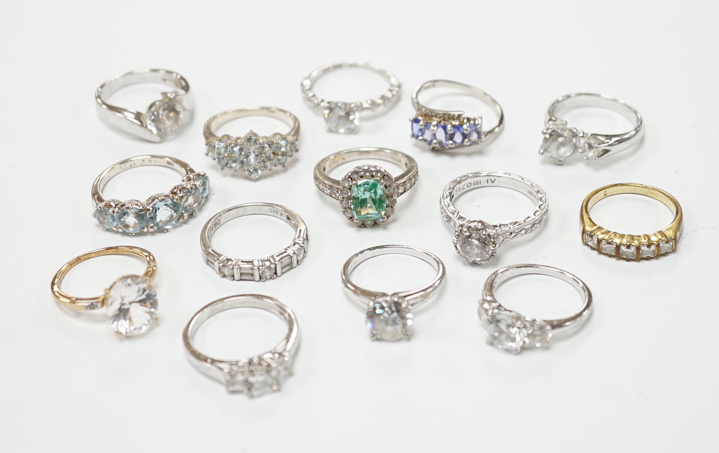 A collection of assorted paste set dress rings and sundry costume jewellery
